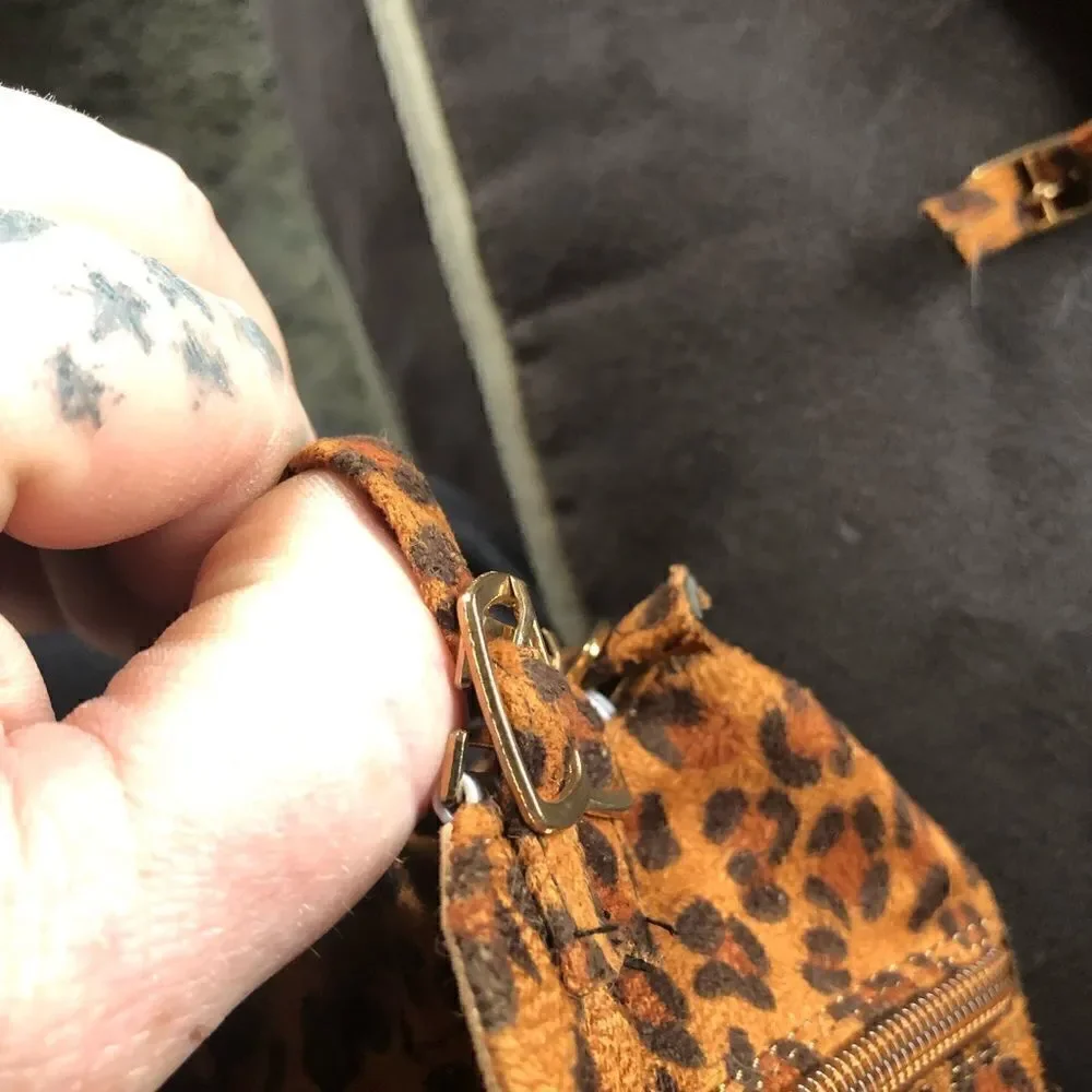 New never worn animal print buckle sandals. Side clasps . Zipper up the back.